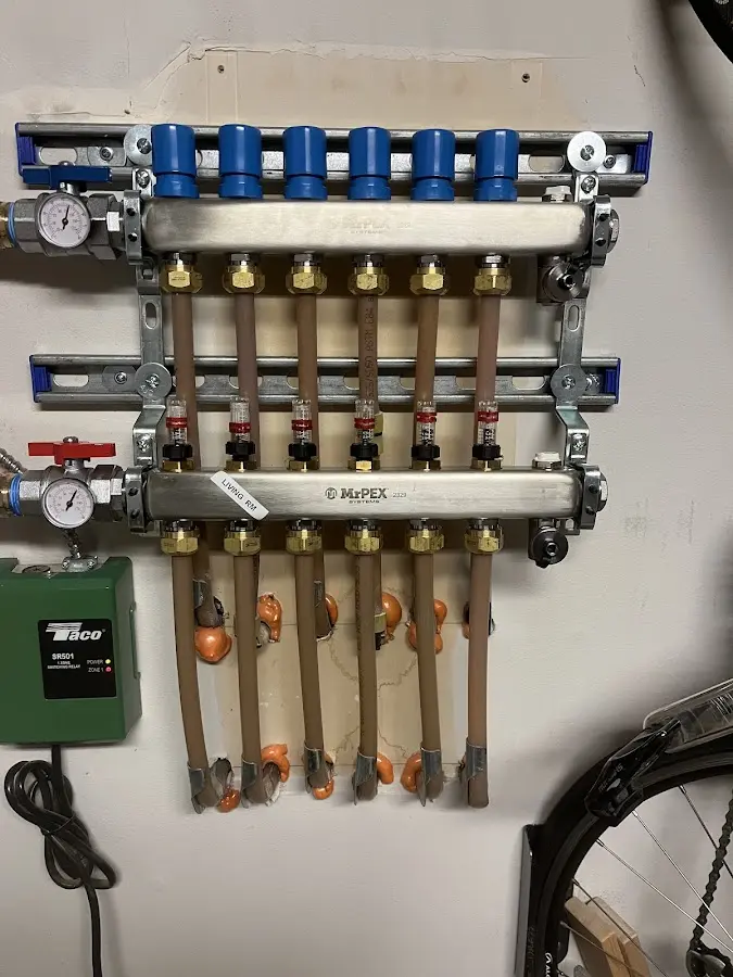 Plumber performing Water Heater Repair at a residential property in Polk